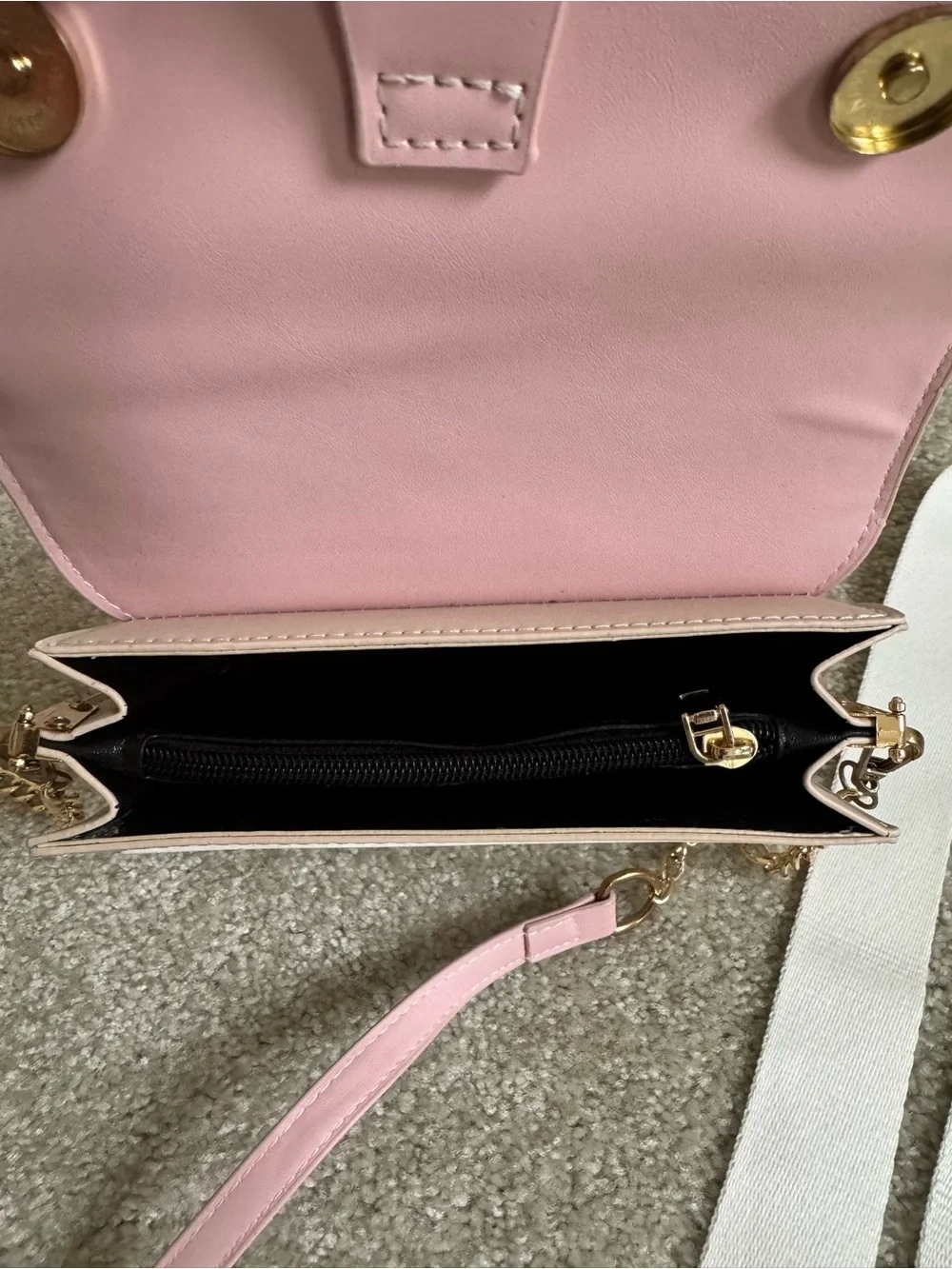 Compact Pink and White Crossbody Bag with Adjustable Strap